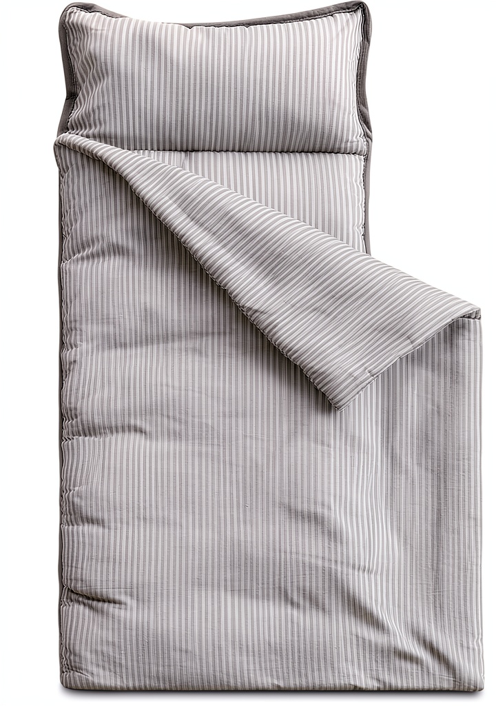 Child sleeping comfortably on Wake In Cloud striped nap mat in a preschool setting